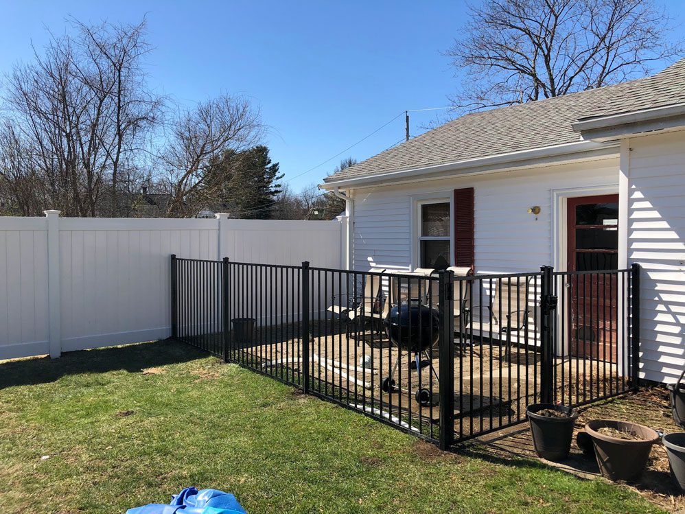 Fenced in pool in back yard